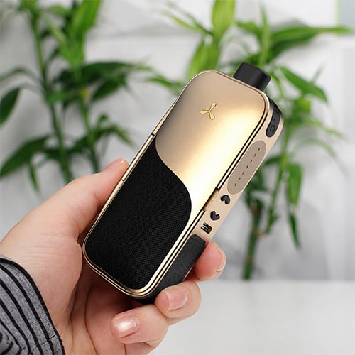 Hand holding a AirVape Legacy Core vaporizer