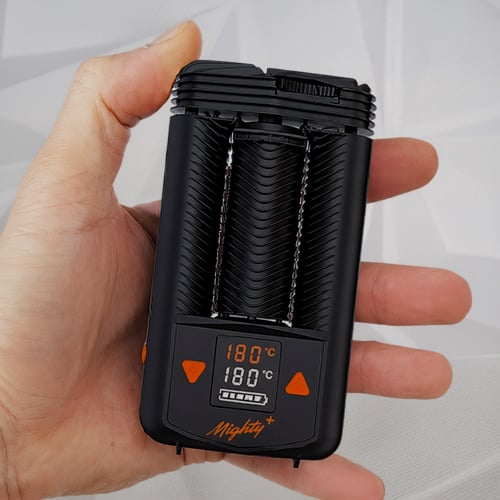 Hand holding a Mighty Plus vaporizer.