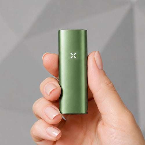 Hand holding a Pax Flow vaporizer