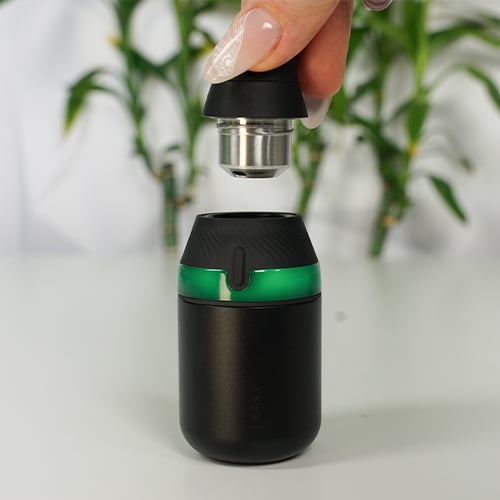 Puffco Proxy Core Kit - a process of attaching the mouthpiece cap onto the device base