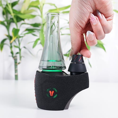 Utillian 8 Turbo on a table while woman spins the dual spinner cap