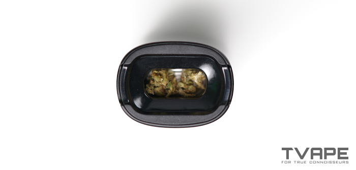 Pax 4 vaporizer - a close-up view of the heating chamber with the dry herb filled in inside