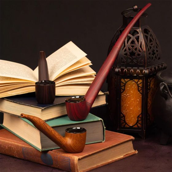 Pulsar 510 DL Wizard Pipe wood finish styled on stacked books with a lantern, classic wizard pipe look